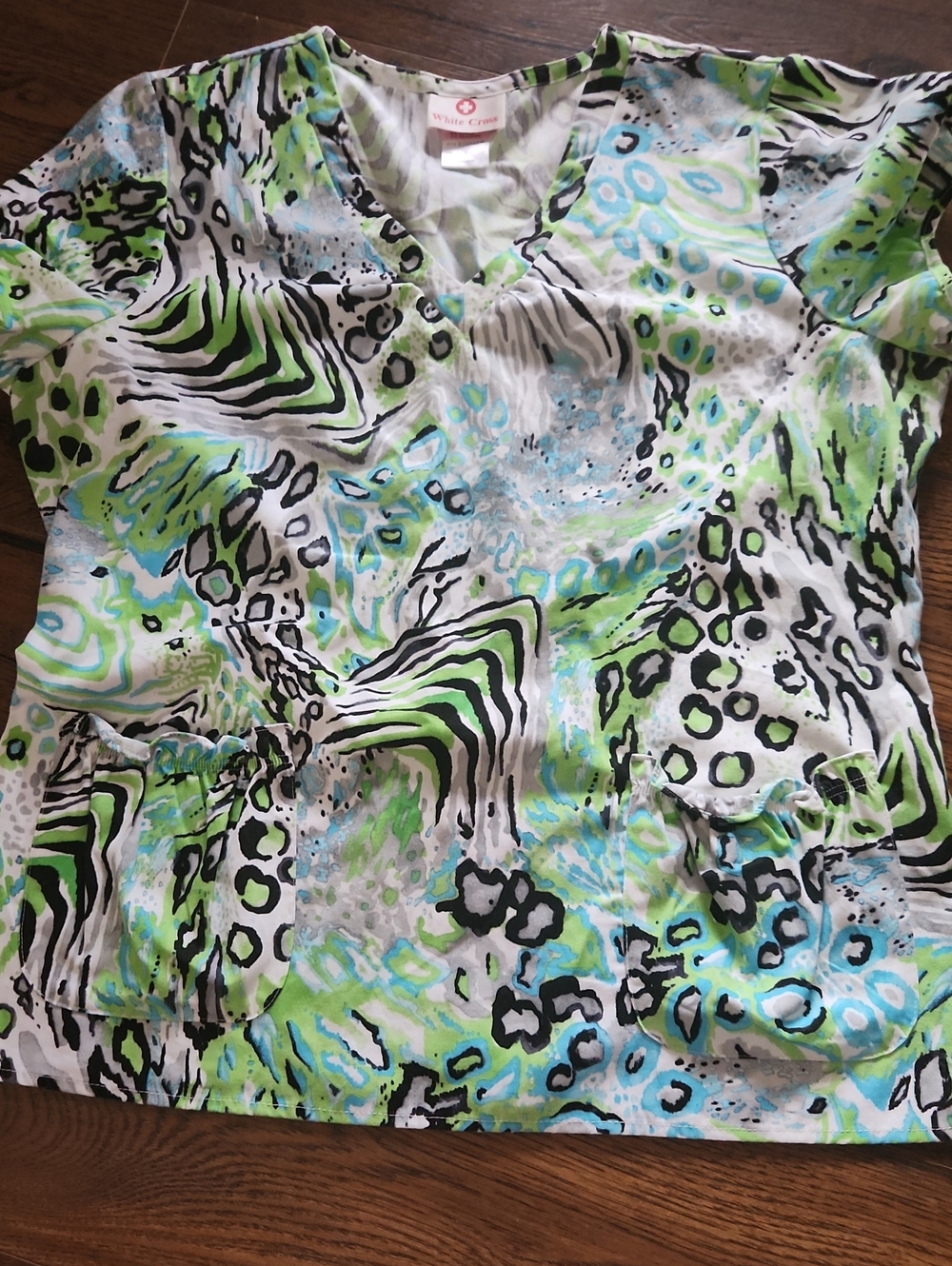 White Cross Women's Green & Blue Printed V-Neck Top